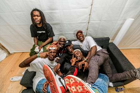 A photograph of Afrobeats group La Même Gang for The Red Bulletin.