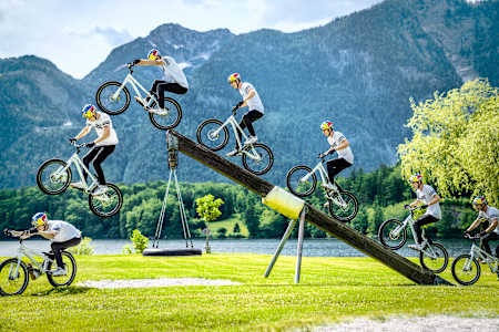A sequence photograph of Fabio Wibmer performing a stunt at Lake Hallstatt, Austria.