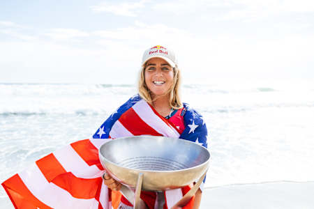Caroline Marks and the world surfing champion trophy