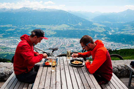 Stefan Eberharter and Tom Öhler take a break for lunch in Innsbruck, Austria, July 10, 2019.