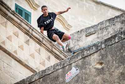 Didi Alaoui of Morocco performs during finals at the Red Bull Art of Motion freerunning competition in Matera, Italy on October 5, 2019
