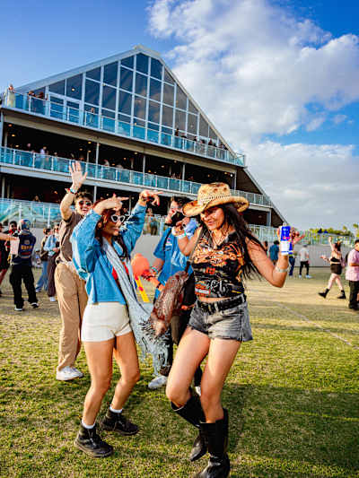 Festival-goers in good spirits at Red Bull Mirage during Coachella 2025