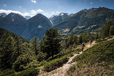 MTB riders Ludo May and Yann Guigoz ride the descent from Hannigalp to Graechen on June 26, 2018.