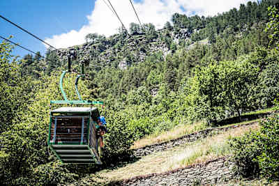 MTB riders Ludo May and Yann Guigoz ride the Embd cablecar, Switzerland, on June 26, 2018.