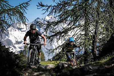 MTB riders Ludo May and Yann Guigoz ride trails at Moosalp, Switzerland on June 26, 2018.