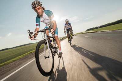 CaptionMarcelo Florentino Soares from Brasil and Eduard Fuchs from Austria race during the 6th stage Tyumen-Omsk.