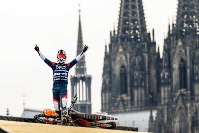 Triumphant: Luc Ackermann celebrates in front of Cologne Cathedral