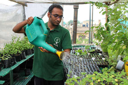 Kaustubh waters the khets