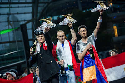 (L–R) Longest Distance winner Veselin Ivanov, Aerobatics winner Avedis Tchamitchian and airtime winner Karen Hambardzumyan  at Red Bull Paper Wings World Final 2015 in Salzburg on May 9, 2015.