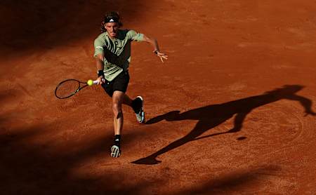 Stefanos Tsitsipas of Greece in action against Novak Djokovic of Serbia in the final on day eight of Internazionali BNL D'Italia at Foro Italico on May 15, 2022 in Rome, Italy.  
