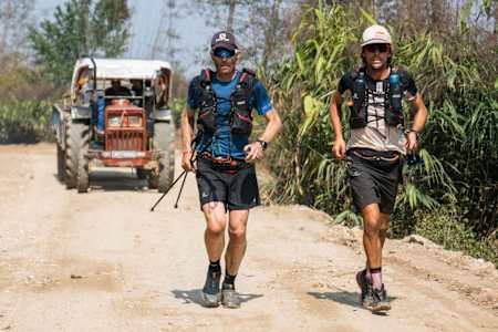 Ryan Sandes and Ryno Griesel run through the farmlands of eastern Nepal.