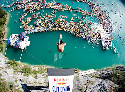 Orlando Duque cliff diving during the Red Bull Cliff Diving World Series at Lake Wolfgangsee in 2008.