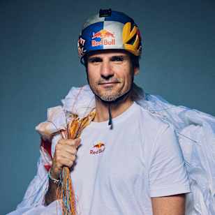 Horacio Llorens poses in his Red Bull helmet and paragliding gear during the Spanish Red Bull Athlete Summit in Andorra on January 31, 2024.
