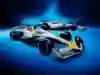 The new VCARB 02 cars on a blue background.