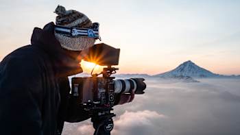 Basti Balser filming during golden hour in Kamchatka, Russia.