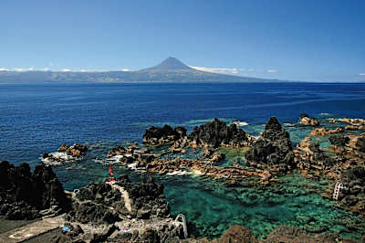 A view of Mount Pico on Pico Island from the coast of Sai Jorge island.