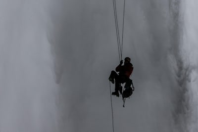 Canadian climber Will Gadd making the first ascent of Helmcken Falls, BC, Canada