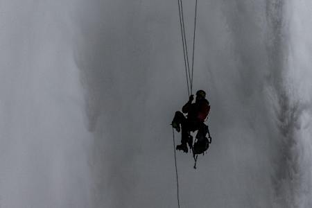 Canadian climber Will Gadd making the first ascent of Helmcken Falls, BC, Canada