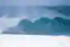 Surfer Yago Dora rides the tube at Pipeline in Hawaii