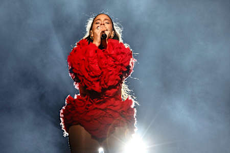 A photo of Spanish pop sensation Rosalía performing live during the launch of her album El Mal Querer in Madrid, Spain, on November 31, 2018.