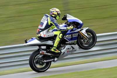 Valentino Rossi pulls a wheelie at Assen