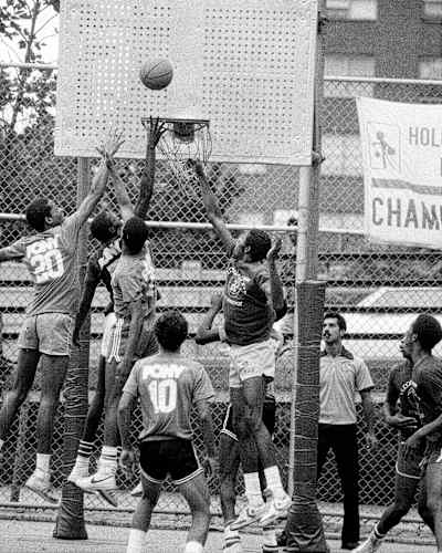 Players compete in 'Rucker' street basketball tournament in Harlem, New York, which was the first streetball contest when it started in 1950