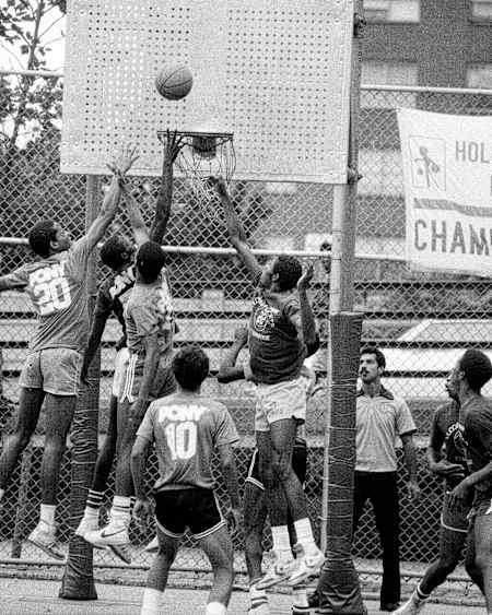 Players compete in 'Rucker' street basketball tournament in Harlem, New York, which was the first streetball contest when it started in 1950