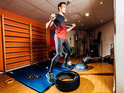 Thierry Neuville undergoes endurance training in the gym.