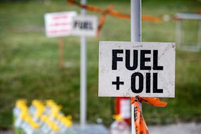 A photo of a sign for a fuel and oil stop at Red Bull Romaniacs in Sibiu, Romania, in July 2018.