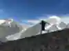 Global adventurer Jamie Ramsay runs through the Alps.