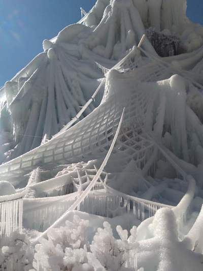 An image of a man-made ice structure in the Himalayas, made by the Ice Stupa Project.