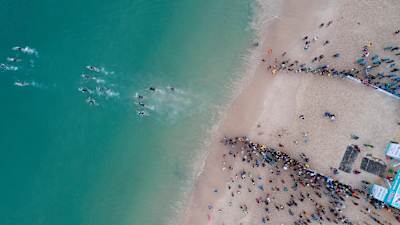 The swim takes place in two bodies of water – separated by a sprint on land