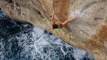 Angie Scarth-Johnson climbs a sheer rockface during filming of Reel Rock