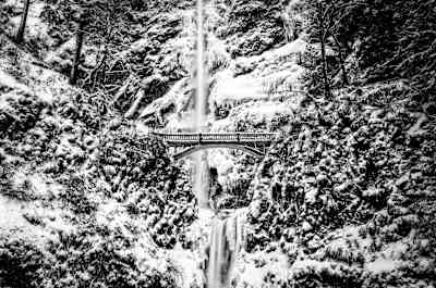 Frozen Multnomah Falls over the Columbia River in Oregon.