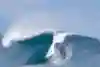Yago Dora drops in late to a wave at Pipeline in Hawaii
