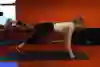 Demonstration of the second stage of a one-legged push-up.