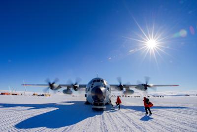 A US Air Force C-130 cargo plane idles at the Williams Skiway in Antarctica.