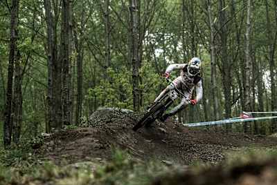Loïc Bruni takes a strong stance Loic Bruni rides at the Lourdes DH World Cup in 2017.