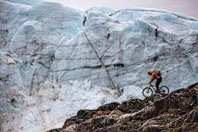 Petr Kraus biking on the Russel Glacier.