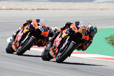 KTM stars Brad Binder and Miguel Oliveira each other race around the Circuit de Catalunya.