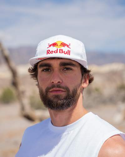 Arda Saatçi is photographed in Death Valley, USA, ahead of the 2026 Red Bull Cyborg Season Ultra 600, wearing a Red Bull cap and day one shirt under intense desert conditions