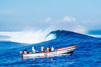 An empty wave breaks at Cloudbreak in Fiji