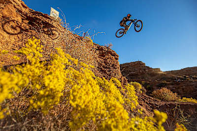 Mountain biker Andreu Lacondeguy launching a huge drop at Red Bull Rampage 2019.