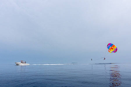 Estonia's Jaan Roose seen during a boundary-breaking slackline walk from a parasail to the boat towing it in the Maldives in 2025.