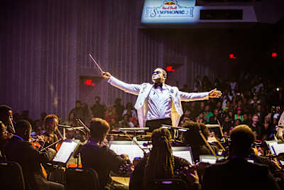 Maestro Jason Ikeem Rodgers leads Orchestra Noir during Red Bull Symphonic
