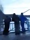 Craig McMorris, Mark McMorris and Eero Ettala on a bridge in Finland.