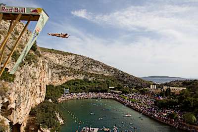 Ukrainian Sacha Kutsenko takes a cliff dive during Red Bull Cliff Diving in Greece. 