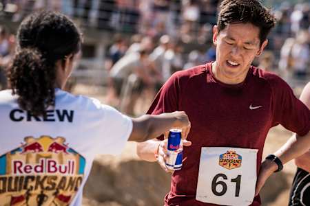 A 250ml can of Red Bull contains 28g of carbohydrates