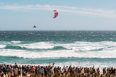 Pro kitesurfer Lasse Walker doing a Megaloop board-off. 