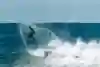 Julian Wilson performs an aerial while surfing in Newcastle, Australia.